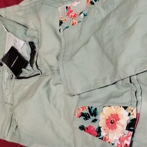 Green and floral print bell-bottoms jeans